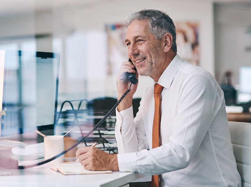 Jed on phone to client